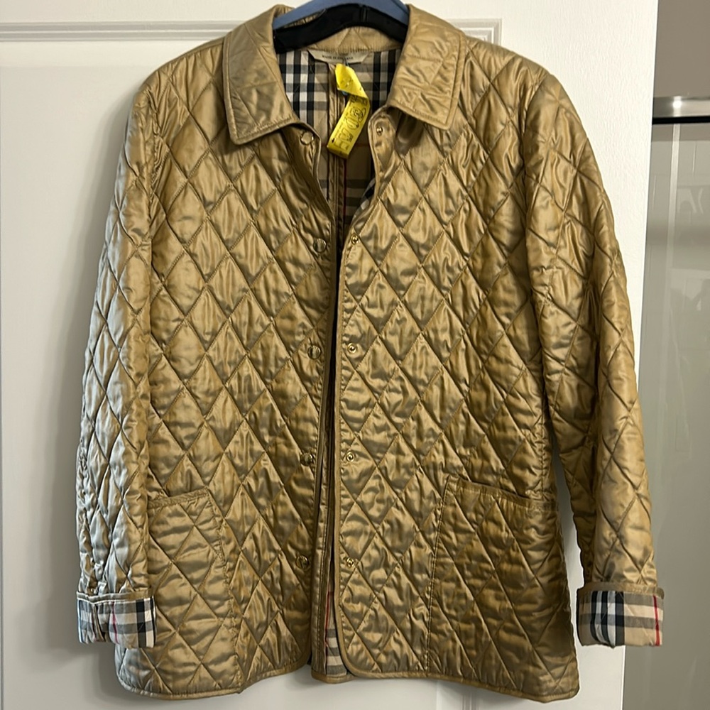 Burberry quilted jacket.  Excellent condition.  Minimal wear, no signs of use!